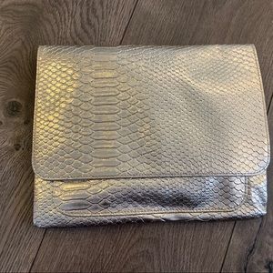 Gold snakeskin print clutch
